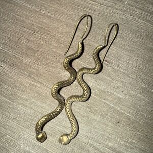 Golden serpent earrings